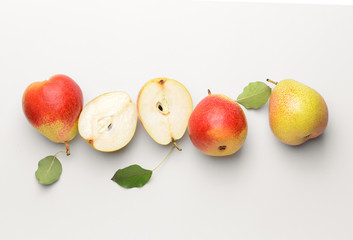 Sweet ripe pears on white background