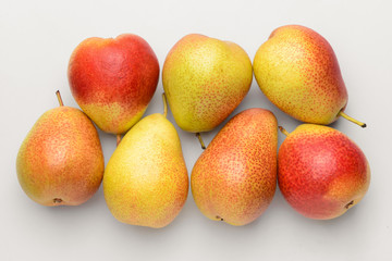 Sweet ripe pears on white background