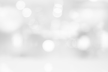 Abstract black and white bright bokeh background with white table top for backdrop design, bokeh...