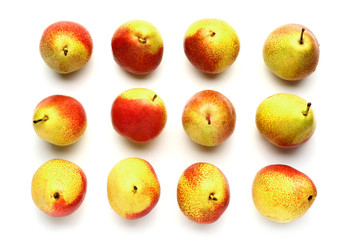 Sweet ripe pears on white background