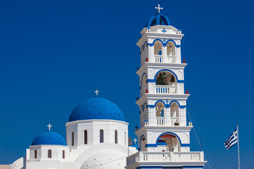 The Church of Holy Cross in the central square of Perissa on Santorini Island
