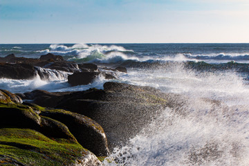 waves crashing on the rocks