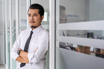 business man with arms crossed