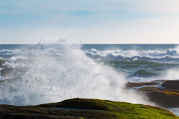 waves crashing on rocks