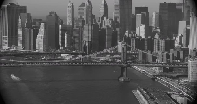 Black and white helicopter aerial footage of George Washington bridge and NY cityscape, drone