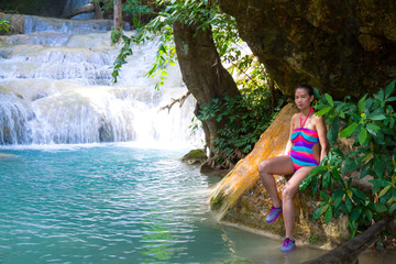 Woman sexy with bikini and waterfall