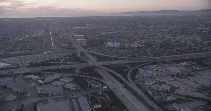 Aerial shot, low light, busy los angeles highway interchange, drone
