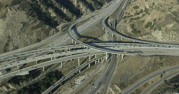 Helicopter aerial shot over major city freeway, drone
