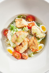 Delicious caesar with chicken fillet top view