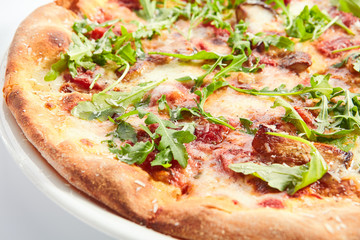 Pizza with porcini mushrooms and truffle oil top view