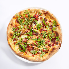 Pizza with porcini mushrooms and truffle oil top view