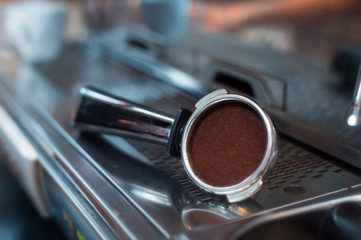 Coffee powder on coffee tamper