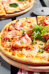 Pizza with Salmon and Rocket Salad