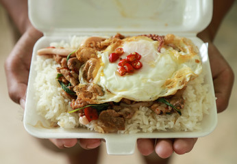 Thai spicy stir meat in foam box 