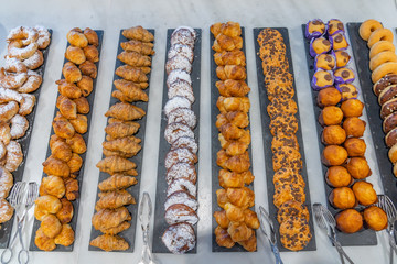 Assortment of pastry croissant in beautiful arrangement at buffet restaurant