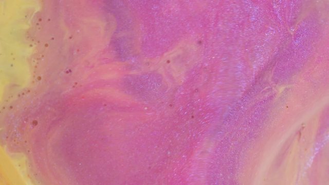 Glitter texture. Pastel colors. Pale yellow, pink, beige, cream color paints mixing
