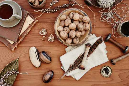 Still life of walnuts and decor on table