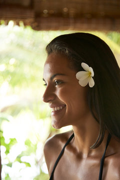 Portrait of smiling ethnic woman in Tahiti