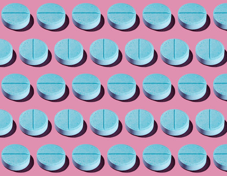 Blue Pharma Pill Pattern on Pastel Pink