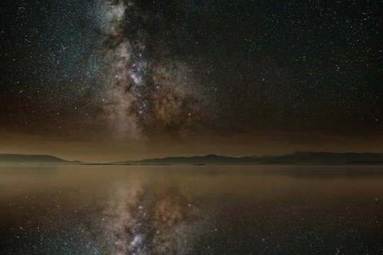 landscape with mountain and lake at night