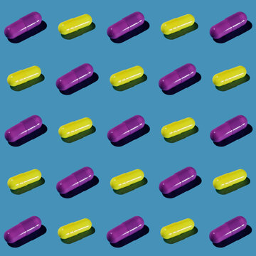 Yellow and Purple Pharma Pill Pattern on Pastel Blue