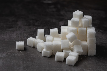 white Sugar cube on table.