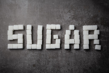 The word sugar from cubes of sugar.