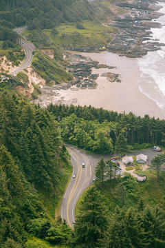Birds eye view of the Pacific Coast Highway on a misty day in Oregon.