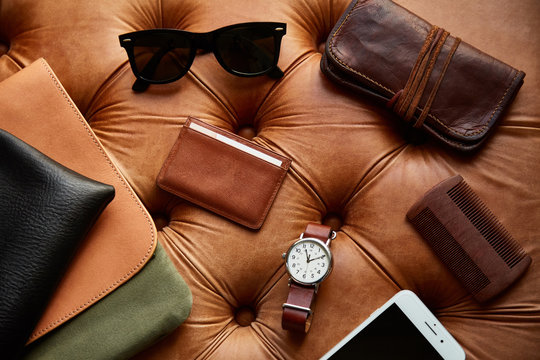 Masculine leather accessories flat lay