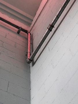 Red reflection on the pipe