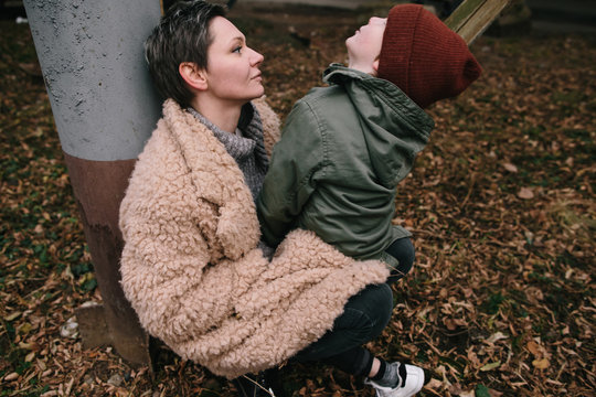 Woman and kid in industrial aria