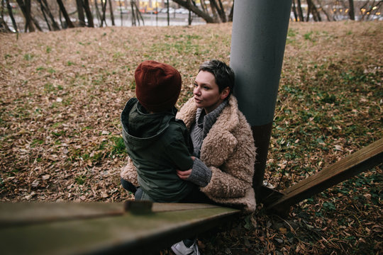 Woman and kid in industrial aria