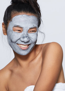 Stunning woman portrait using mud facial mask