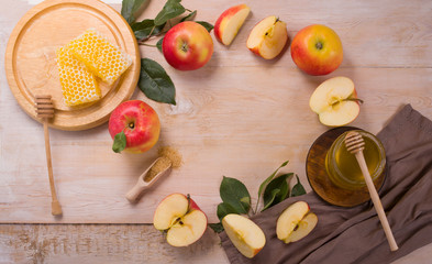 Jewish holiday Rosh Hashana background with apples and honey on blackboard. View from above. Flat lay