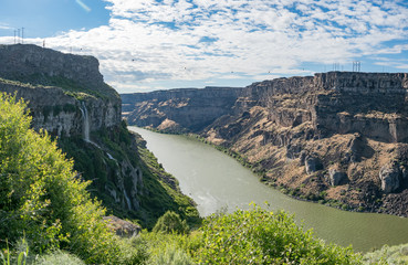 Fototapeta premium Snake Canyon River Gorge as seen from Snake River Rim Trail on sunny summer day near Shoshone Falls Park, Twil Falls, Idaho, USA
