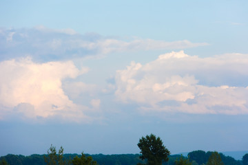 Thick beautiful clouds and clouds in the sky. Cloudy weather before the storm and rain.
