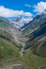 Fototapeta na wymiar stream formed by melting of glacier in the himalayas
