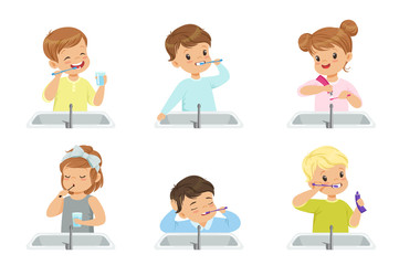Kids brushing teeth set, cute boys and girls caring for their teeth in bathroom vector Illustration on a white background