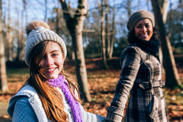 Mother and daughter outdoors