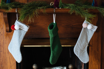 christmas stockings on fireplace mantle
