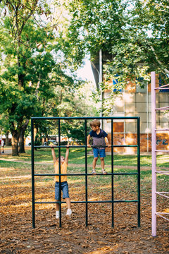 Two little Boys playing in the park