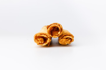 Baked waffles with yellow fruit filling on white background