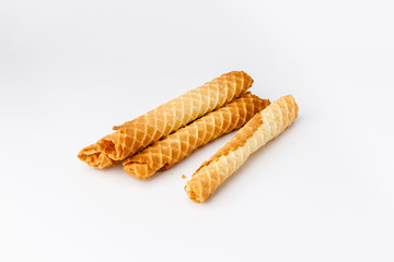 Baked waffles with yellow fruit filling on white background