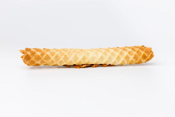 Baked waffles with yellow fruit filling on white background
