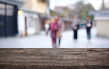 Wood Table Top in Blur Background room interior with empty copy space.