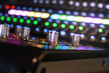 Fototapeta na wymiar DJ CD player audio mixer and amplifier in nightclub.