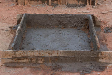 old wooden frame on brick wall