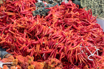Fototapeta premium Dried red hot chili peppers in the market
