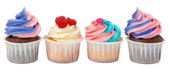 Group of cupcakes with colored topping isolated on white background