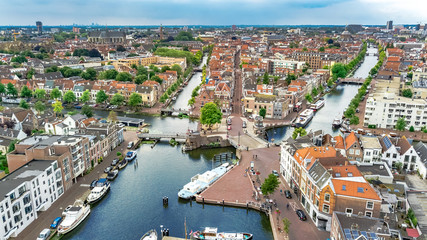 Obraz premium Aerial drone view of Leiden town cityscape from above, typical Dutch city skyline with canals and houses, Holland, Netherlands
